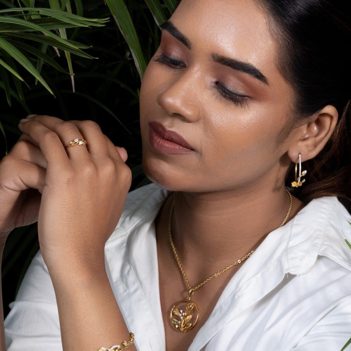 Ruvari Pushpavalli Hoops – Elegant Gold & Diamond Floral Hoop Earrings with Emerald Accents