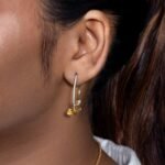 Ruvari Pushpavalli Hoops – Elegant Gold & Diamond Floral Hoop Earrings with Emerald Accents
